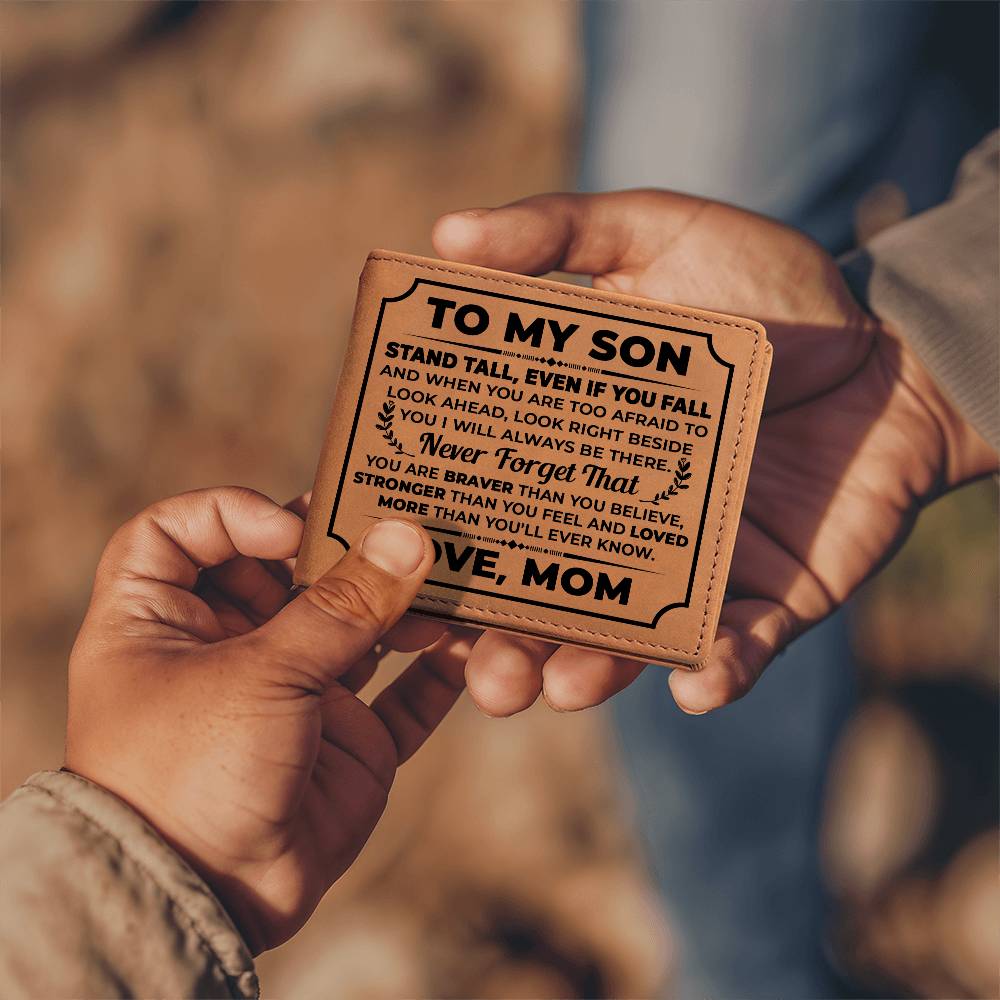 To My Son stand tall leather wallet gift for son being held in hands outdoors.