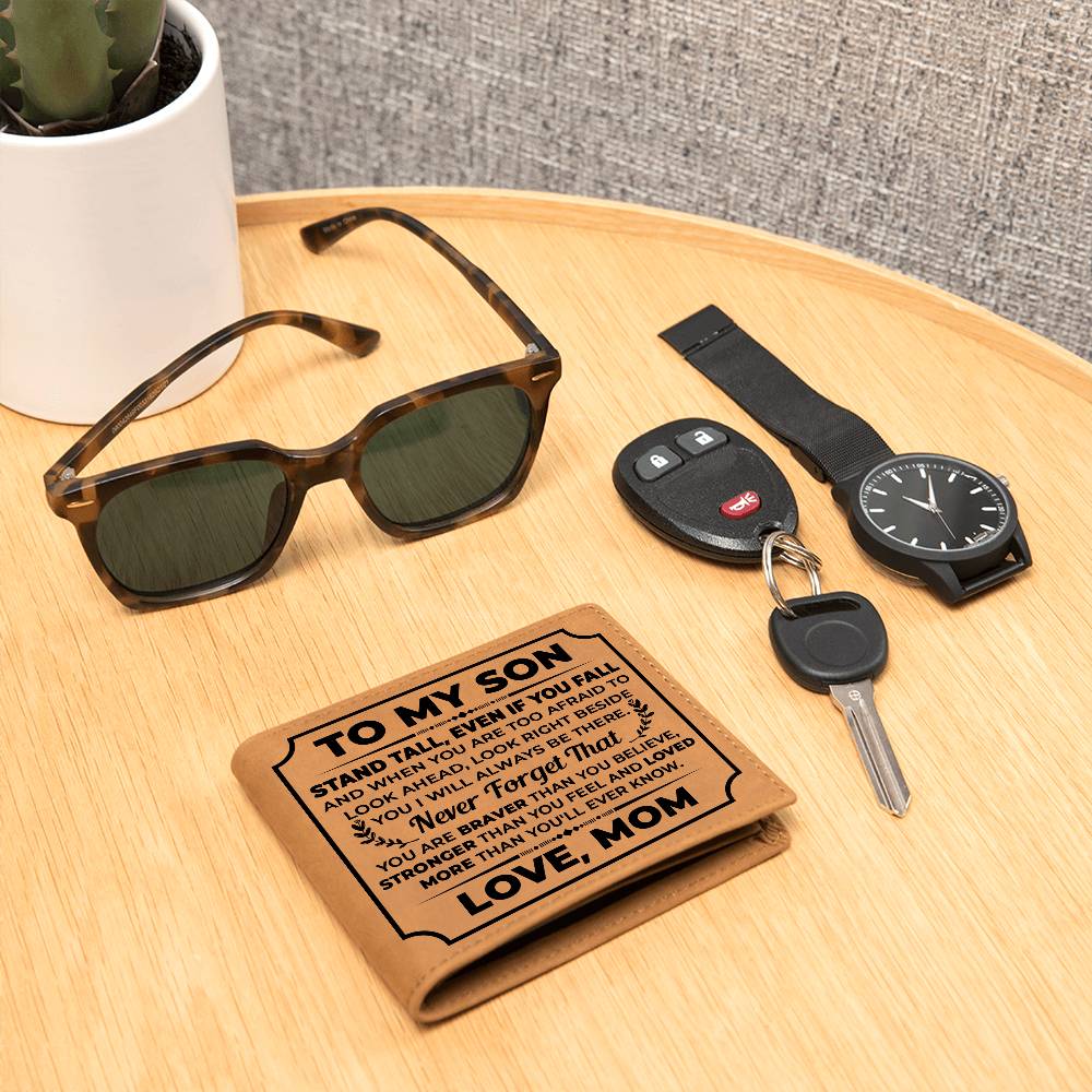Leather wallet gift for son with sunglasses, watch, and keys on a wooden table.