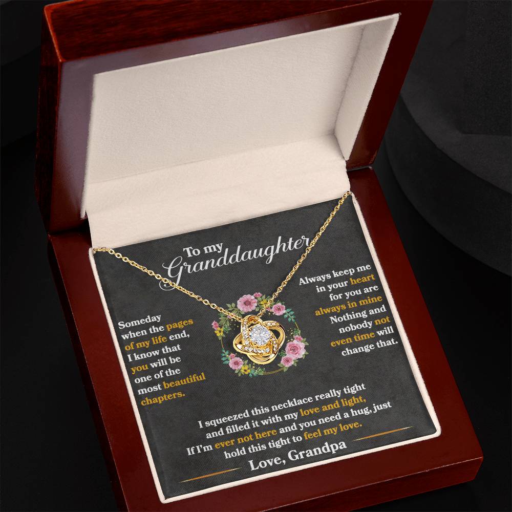 Love knot necklace gift presented in a wooden box with heartfelt message to granddaughter from grandpa.