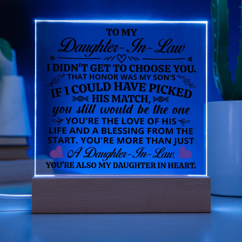 Acrylic plaque for daughter-in-law with heartfelt message displayed on a wooden base with LED lights.