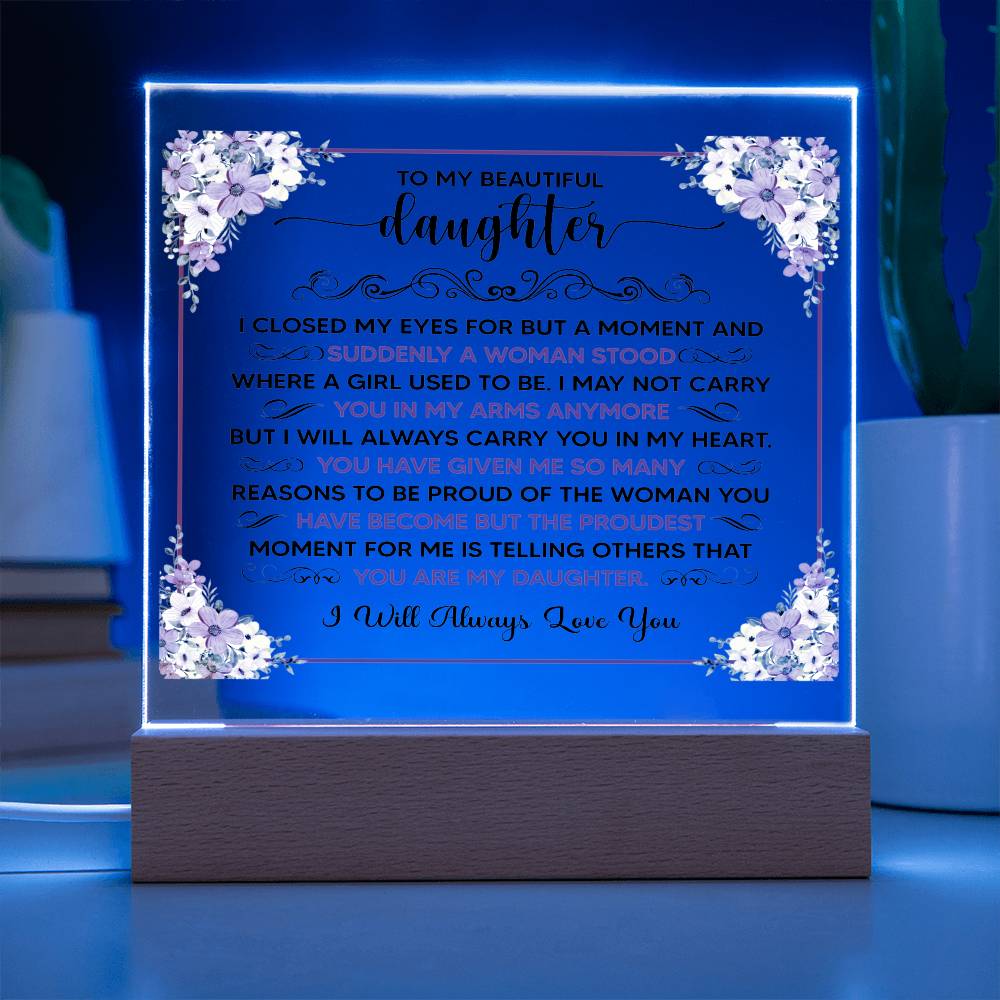 Personalized acrylic plaque for daughter with heartfelt message and floral design on illuminated base.