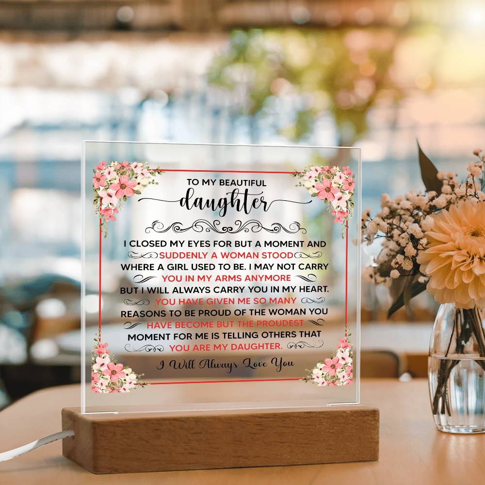 personalized acrylic plaque for daughter with floral design and heartfelt message on display.