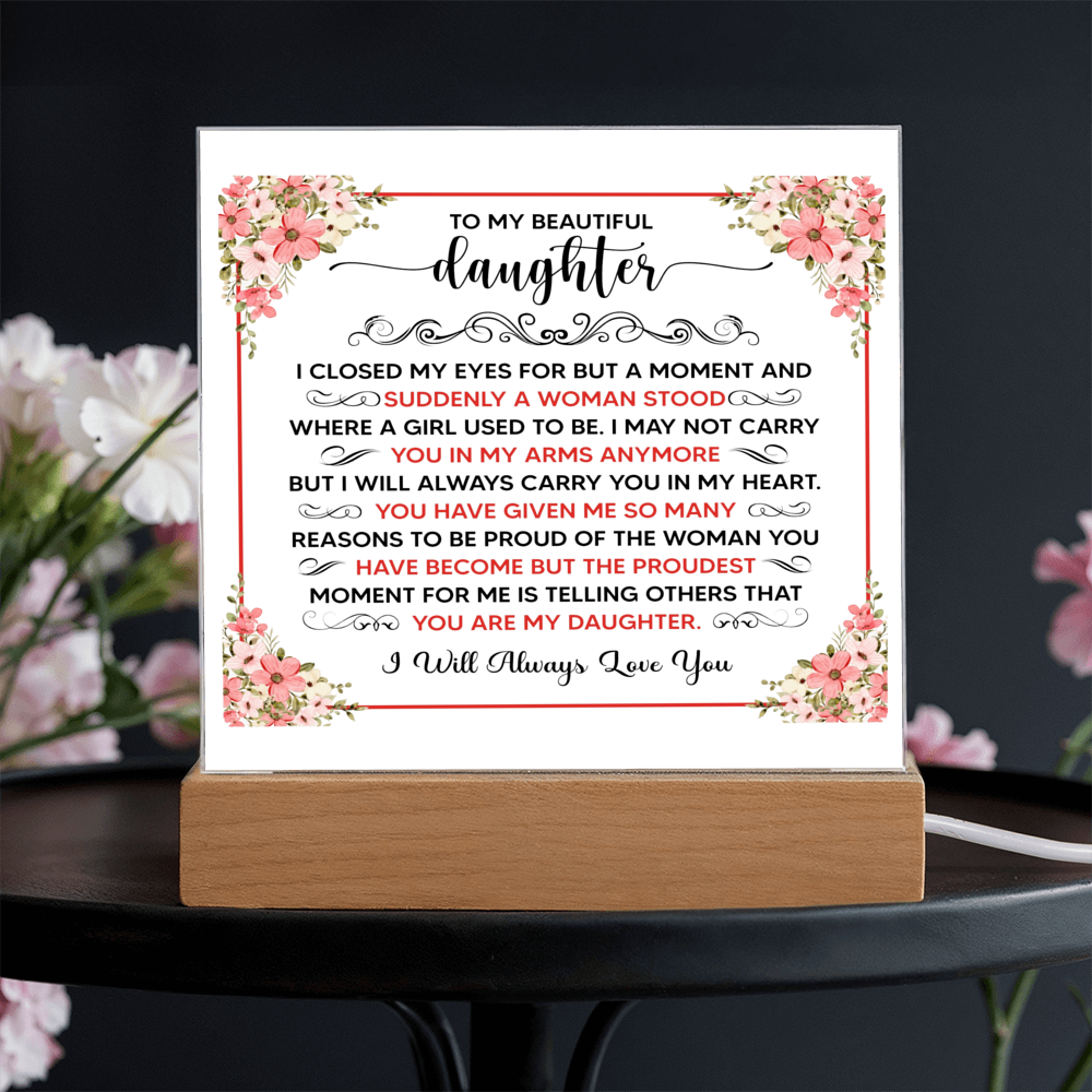 Personalized acrylic plaque for daughter displayed on a wooden base with floral design and heartfelt message.