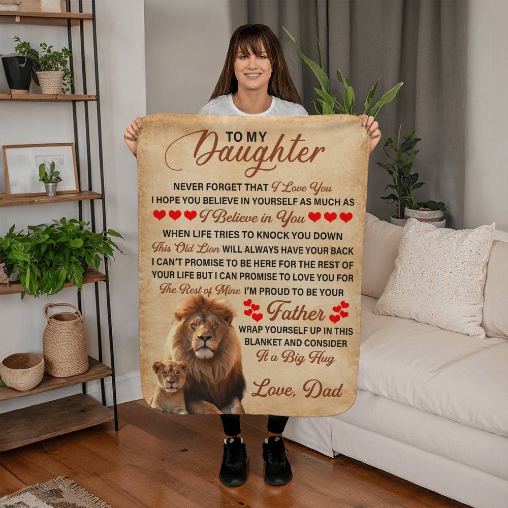 Sherpa Fleece Blanket Gift for Dad Lion Message displayed by a woman, featuring a heartfelt message for daughters.