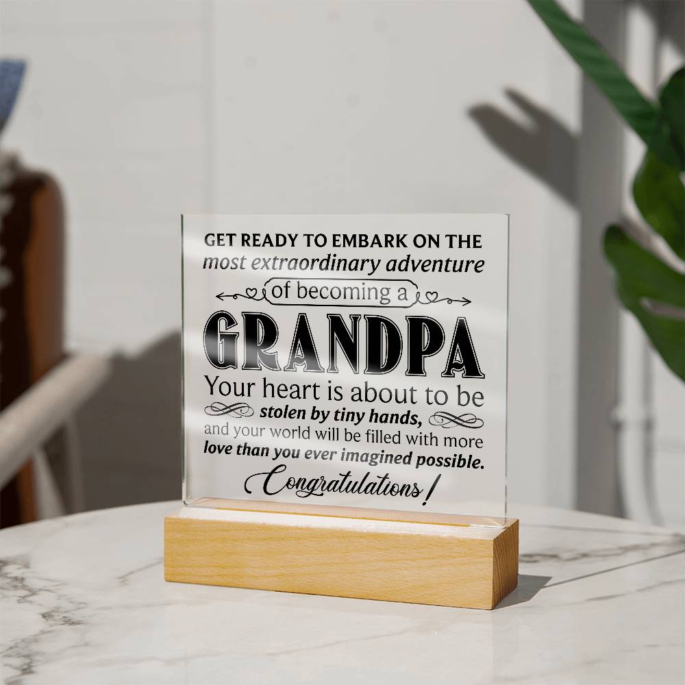 Acrylic square plaque celebrating becoming a grandpa with heartfelt message and wooden base.