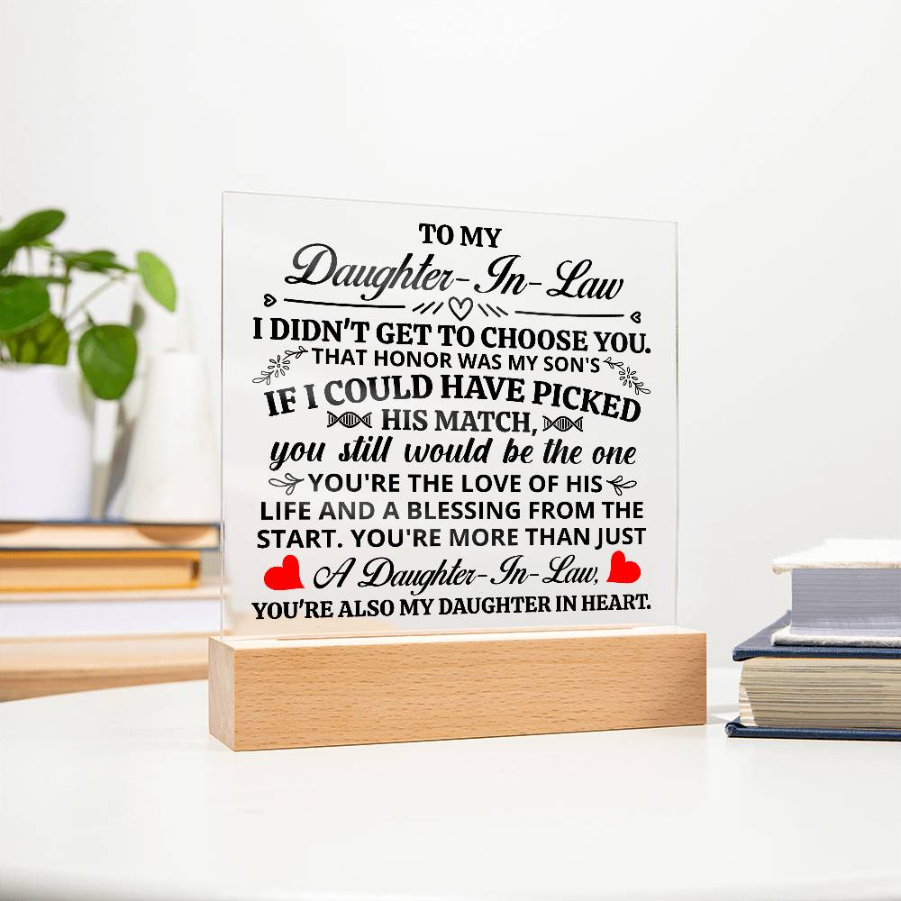 Acrylic plaque for daughter-in-law with heartfelt message displayed on a wooden base.