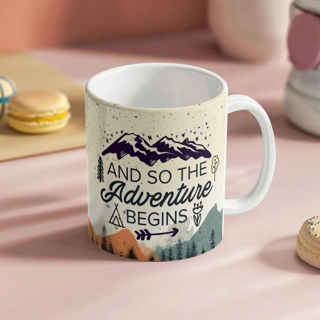 custom ceramic coffee mug featuring adventurous mountain design and whimsical typography.