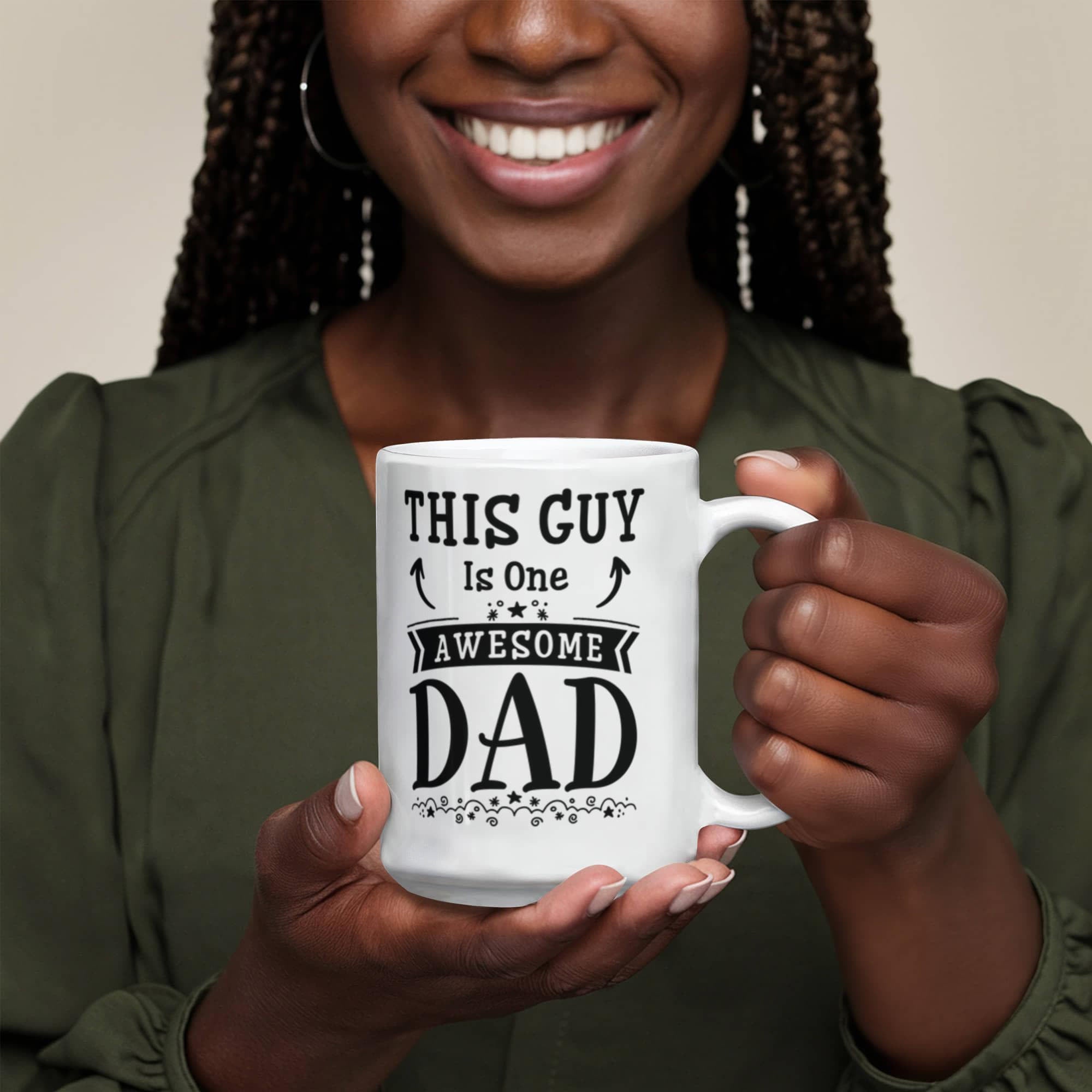 Funny Ceramic Mug Gift for Men and Friends held by a smiling woman, featuring 'THIS GUY Is One AWESOME DAD' text.